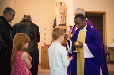 Child Receiving Communion